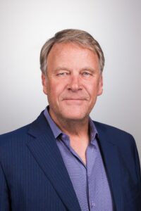 rick j lindsey president and ceo of prime insurance company - headshot with white background